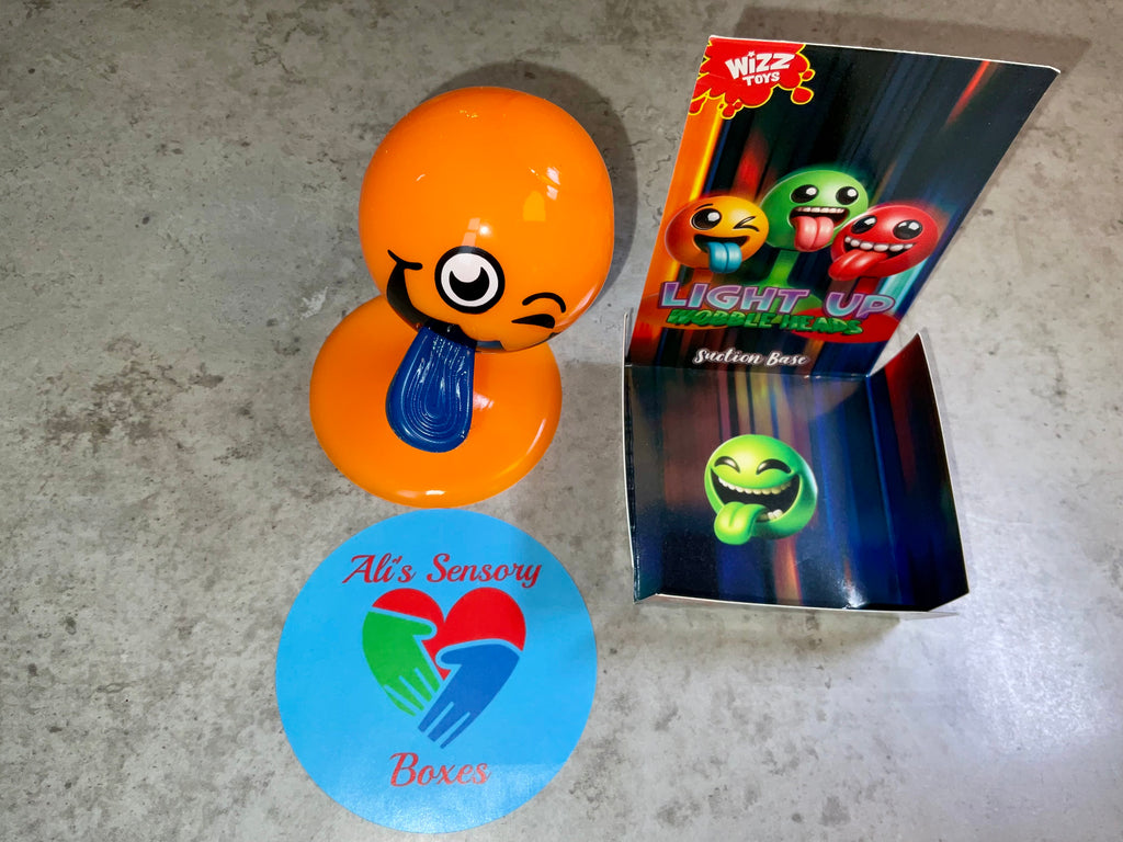 Light Up Wobble Head